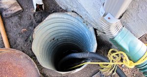 sump pump draining water from basement